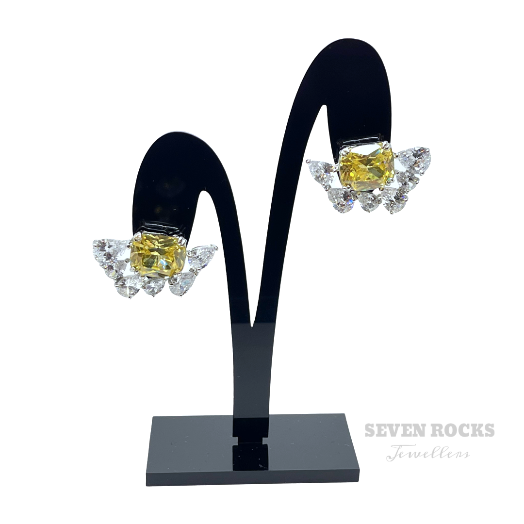 Fancy yellow diamond earrings