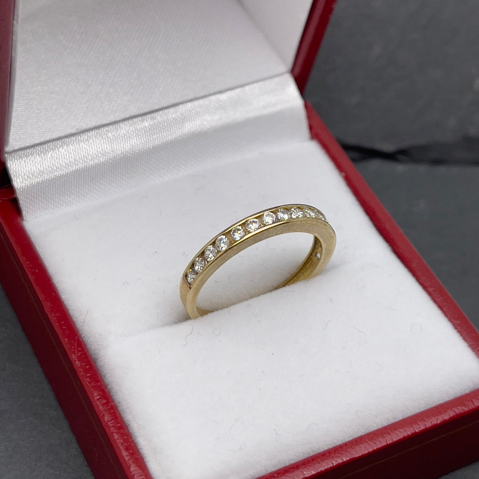 9 K half eternity cz ring